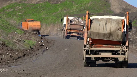 Garbage Trucks Going to the City Dump Stock Footage 87344255