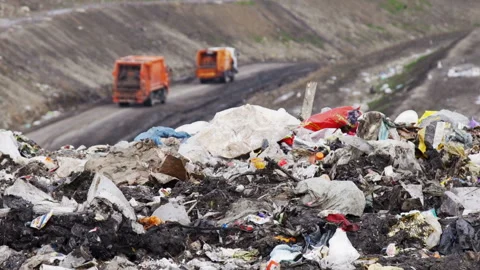 Garbage Trucks Going to the City Dump Stock Footage 87422043