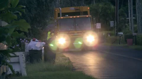 Garbage trucks in paradise Stock Footage 8953104