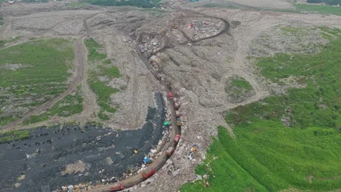 Garbage trucks queuing in bantar gebang landfill aerial view Stock Footage 327820242