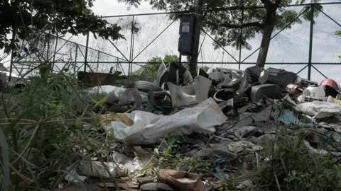 Garbage of used electronic and plastic housewares Stock Footage 132117248