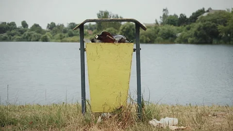 The garbage that was dumped in the camping near the lake Stock Footage 123572090