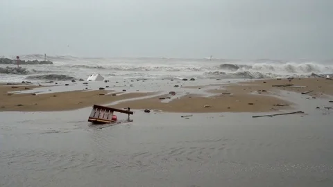 Garbage washed ashore during a sea storm. part of the destroyed pier Vídeos de archivo 123384127