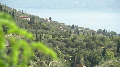 Garda lake view from mountains village on the slopes Stock Footage