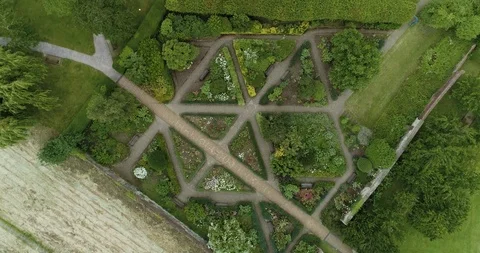Garden architecture with multiple lines and benches throughout drone aerial 4k Stock Footage 118052632