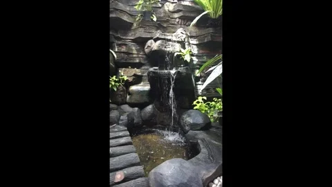Garden artificial waterfall Stock Footage 330185764