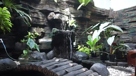 Garden artificial waterfall Video stock 330185788