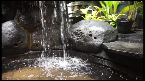 Garden artificial waterfall Stock Footage 330185989