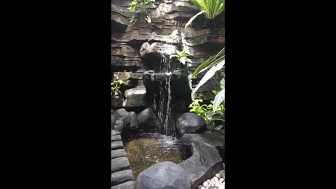 Garden artificial waterfall Video stock 330186013