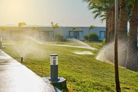 Garden automatic irrigation system. Smarter lawn sprinkler system Stock Photos