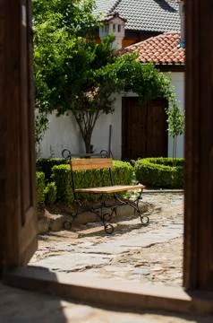 Garden with bench Stock Photos