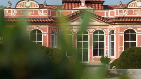 Garden of Cerninsky Palac. Defocused tree in foreground and architecture Stock Footage 97138317