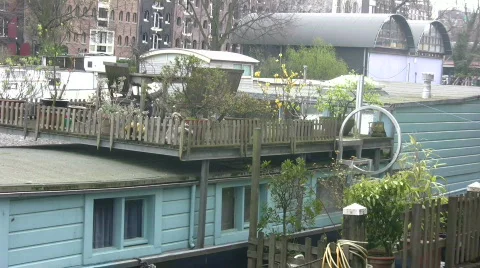 Garden on the deck of a houseboat Stock Footage 123403