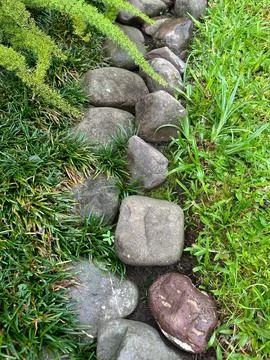 Garden path with stone border Stock Photos