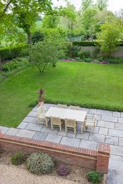 Garden patio in large UK back garden Stock Photos