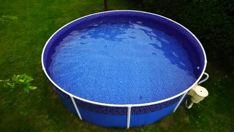 Garden pool with rippling water Stock Footage 130863635