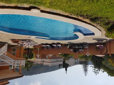 Garden with private pool. Stock Photos
