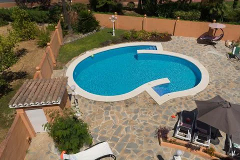 Garden with private pool. Stock Photos