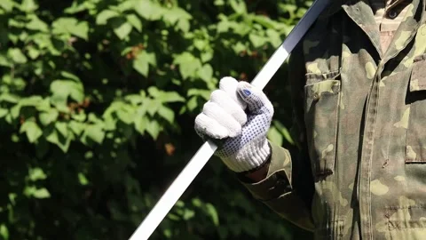 Garden pruner (long-handled pruner), in the hands of a gardener 動画素材 335939585