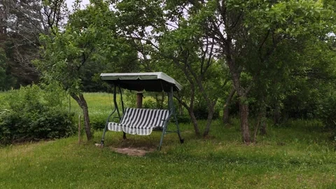 Garden swing outdoors.  Stock Footage 151687465