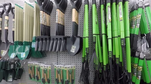 Garden tools on shelves . Medium view. Stock Footage 89156645