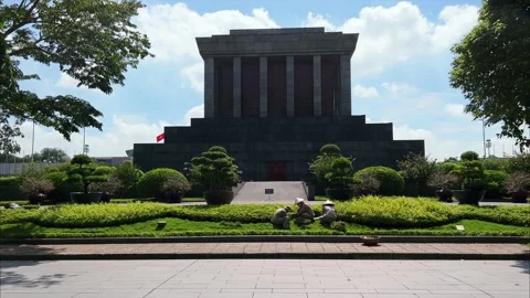 Garden workers in front of Ho Chi Minh Mausoleum in Hanoi on a sunny day Video stock 206433327