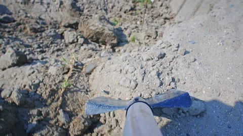 Gardener digs and throws soil Stock-Footage 156942353