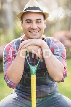 Gardener Man Posing With Forks