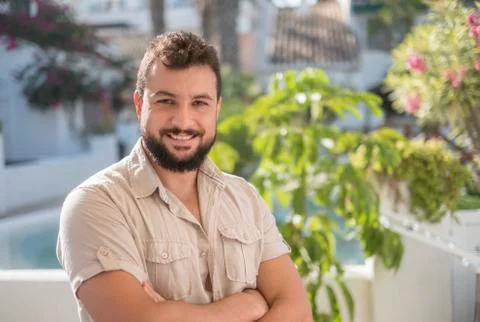 Gardener posing looking at camera in sunny summer day Stock Photos