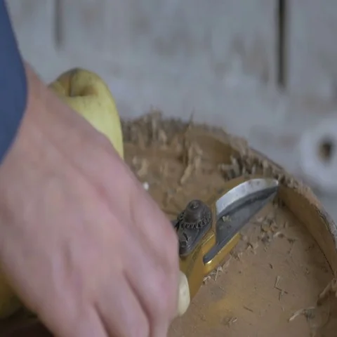 Gardener puts the shears on the table after work. The gardener takes care of the Stock Footage 69672490