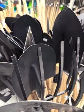 Gardening tools collection at a hardware store during a sunny afternoon Stock Photos