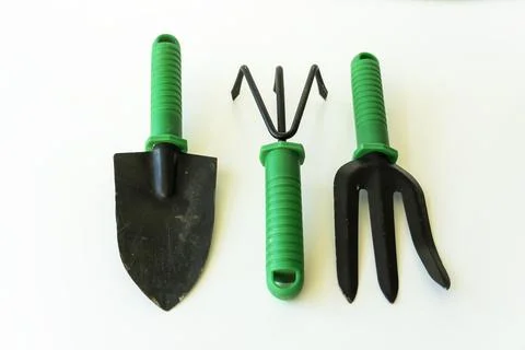 Gardening tools on white background. Spring garden works concept. World env.. Stock Photos