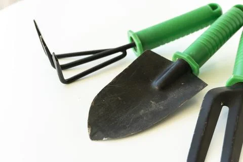 Gardening tools on white background. Spring garden works concept. World env.. Stock Photos