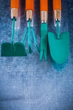 Gardening working objects on scratched metallic background agriculture concept Foto stock