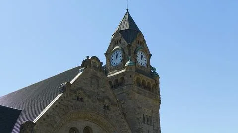 Gare de Metz clock tower under clear blue sky Stock Photos