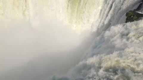Garganta del Diablo waterfall with powerful water flow, mist spray, and Stock Footage 328892880