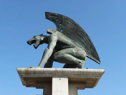 Gargoilles on a column Stock Photos