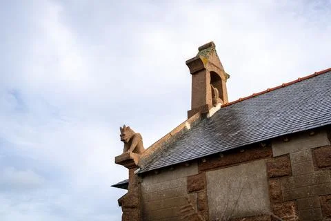 Gargoyle of Chapelle du Diable - Devil Chapel -  overlooking Tregastel coas.. Stock Photos