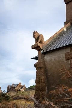 Gargoyle of Chapelle du Diable - Devil Chapel -  overlooking Tregastel coas.. Stock Photos