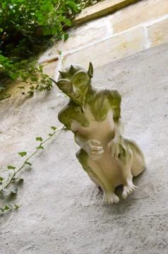 Gargoyle with horns Stock Photos