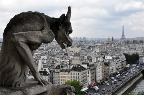 Gargoyle looking at paris Stock Photos