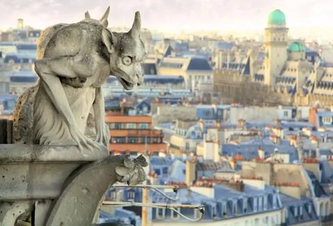 Gargoyle over the Paris Stock Photos