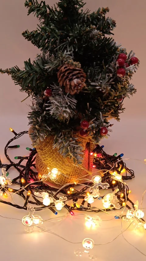 Garland and Christmas tree soft warm glow, festive mood Stock Footage 322677657