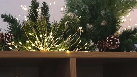 Garland of artificial fir branches.Christmas decor in the home interior. Stock Footage 165581253