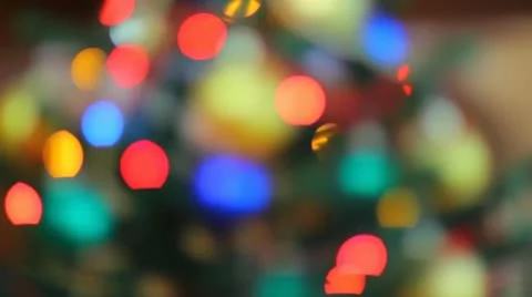 Garland lights of different color sparkling on background (Christmas Tree) Stock Footage