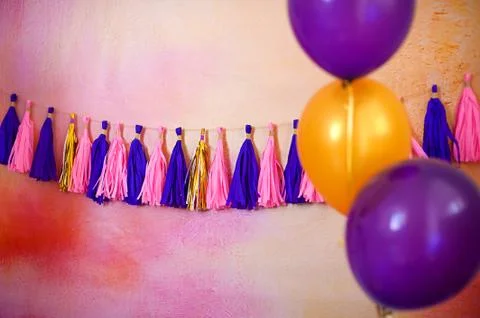Garland on a painted background with multi-colored balloons Stock Photos