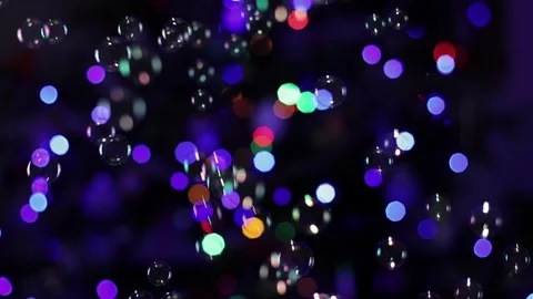 Garlands and soap bubbles in the dark. Stock Footage 265653687