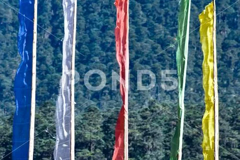Garlands of colorful buddhist prayer flags. Buddhist prayer religious flags w Stock Photos