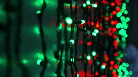 Garlands Fires burn and flicker shimmer in soft focus bokeh Christmas or New Stockbeeldmateriaal 70858544