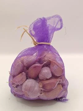 Garlic in a bag Stock Photos